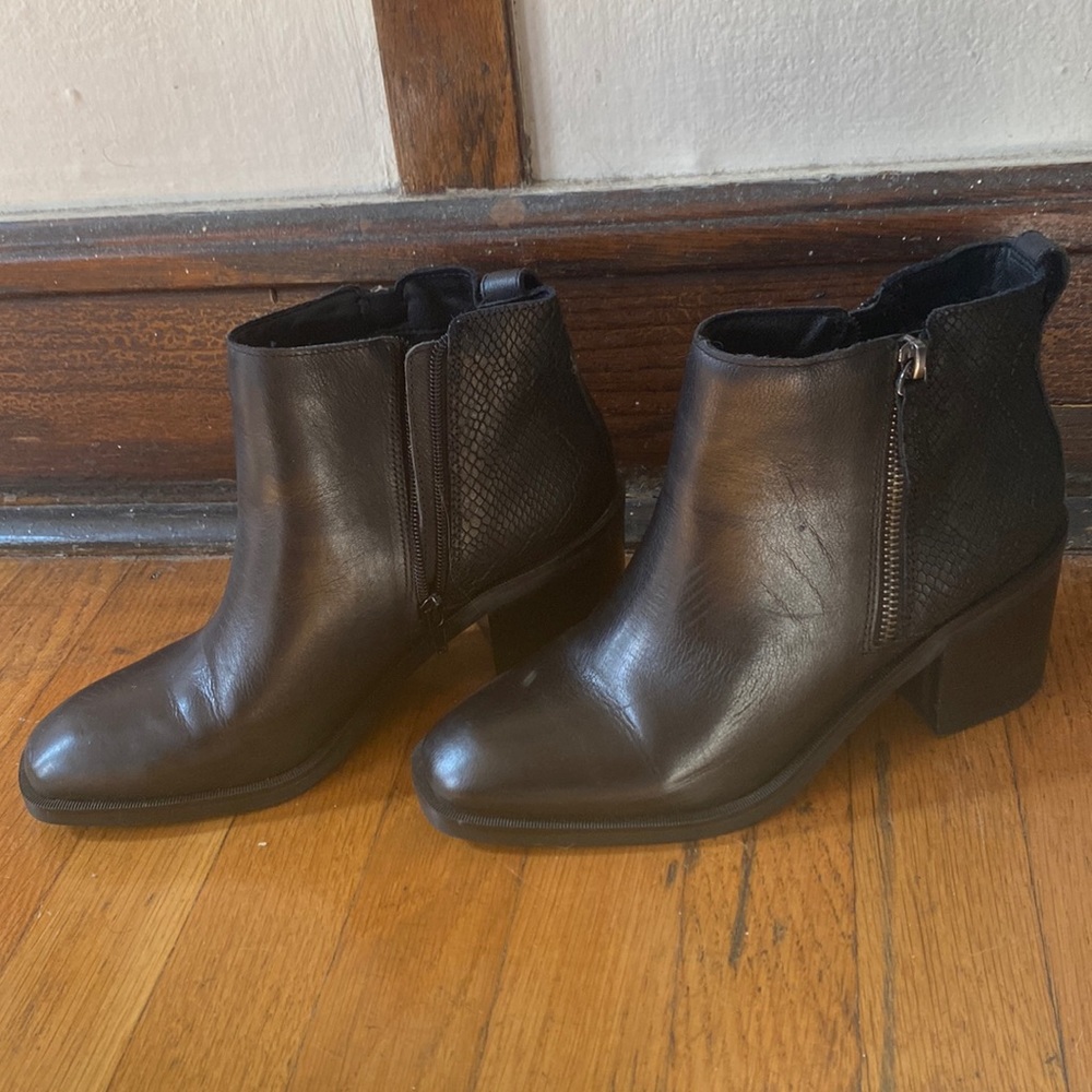Heeled booty with a snake skin detail on heel! Barely worn in great condition